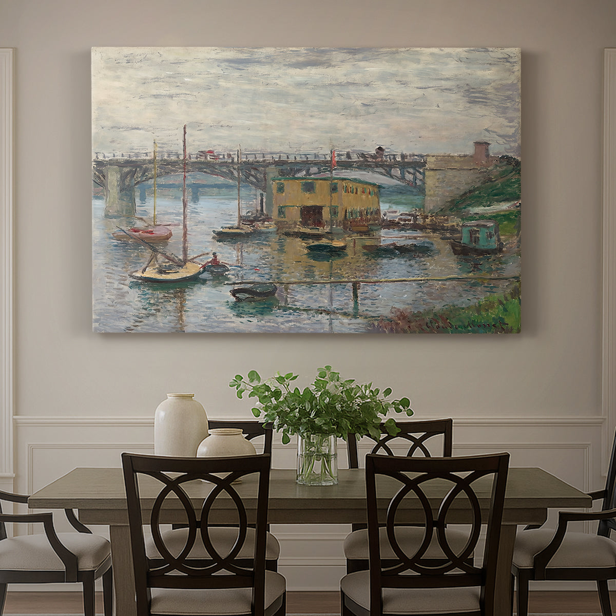 Canvas art print featuring a bridge crossing river under gray sky with muted reflections, showcased as a statement wall artwork