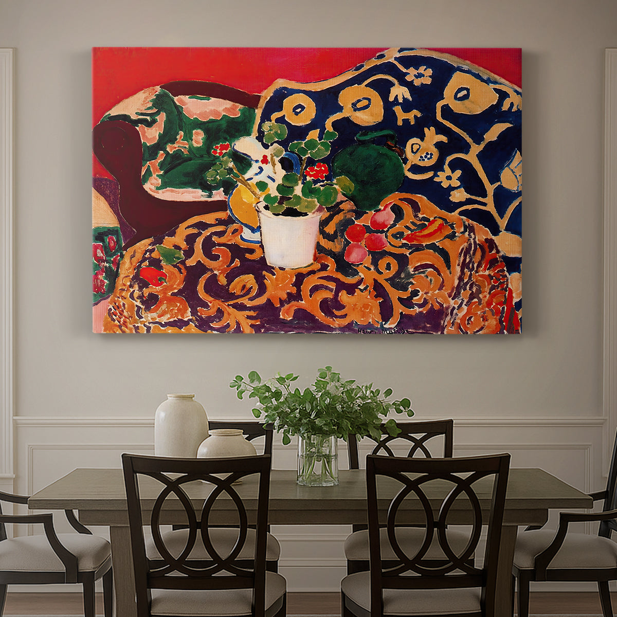Canvas art print featuring a vibrant still life with fruit, vessels, and patterned objects on a table, showcased as a statement wall artwork