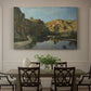 Canvas art print featuring a river flowing between rocky cliffs under open sky, showcased as a statement wall artwork