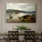 Canvas art print featuring figures and boats gathered along shoreline in calm coastal setting, showcased as a statement wall artwork
