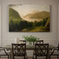 Canvas art print featuring a calm river landscape with trees and distant hills under soft light, showcased as a statement wall artwork