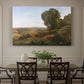 Canvas art print featuring a peaceful landscape with trees and distant horizon under soft light, showcased as a statement wall artwork