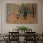 Canvas art print featuring a man and children walking together through forest carrying tools, showcased as a statement wall artwork