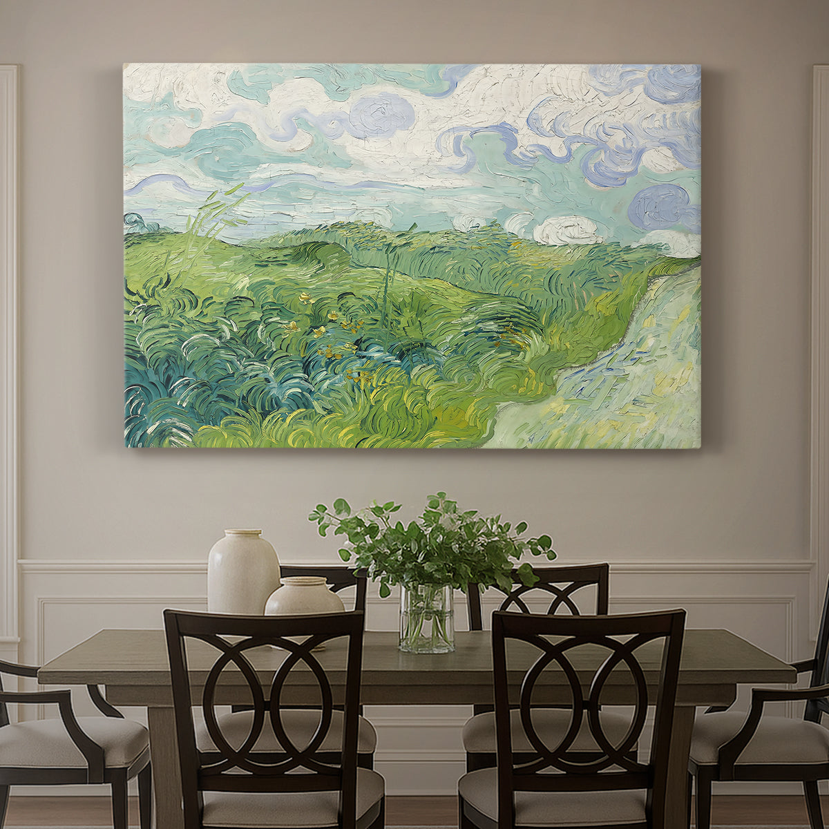 Canvas art print featuring a vivid green wheat field stretching across rolling landscape under pale sky, showcased as a statement wall artwork