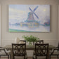 Canvas art print featuring a windmill beside water in quiet town landscape, showcased as a statement wall artwork