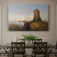 Canvas art print featuring a coastal landscape with ruined tower overlooking sea, showcased as a statement wall artwork