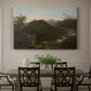 Canvas art print featuring a mountain valley at sunrise with light spreading across trees and hills, showcased as a statement wall artwork