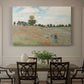 Canvas art print featuring a field of red poppies with figures walking across rolling landscape, showcased as a statement wall artwork