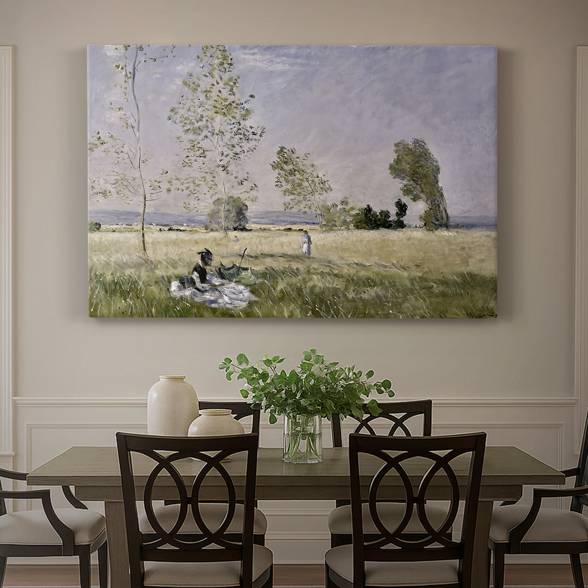 Canvas art print featuring a woman seated in grassy field beneath tree in bright summer landscape, showcased as a statement wall artwork