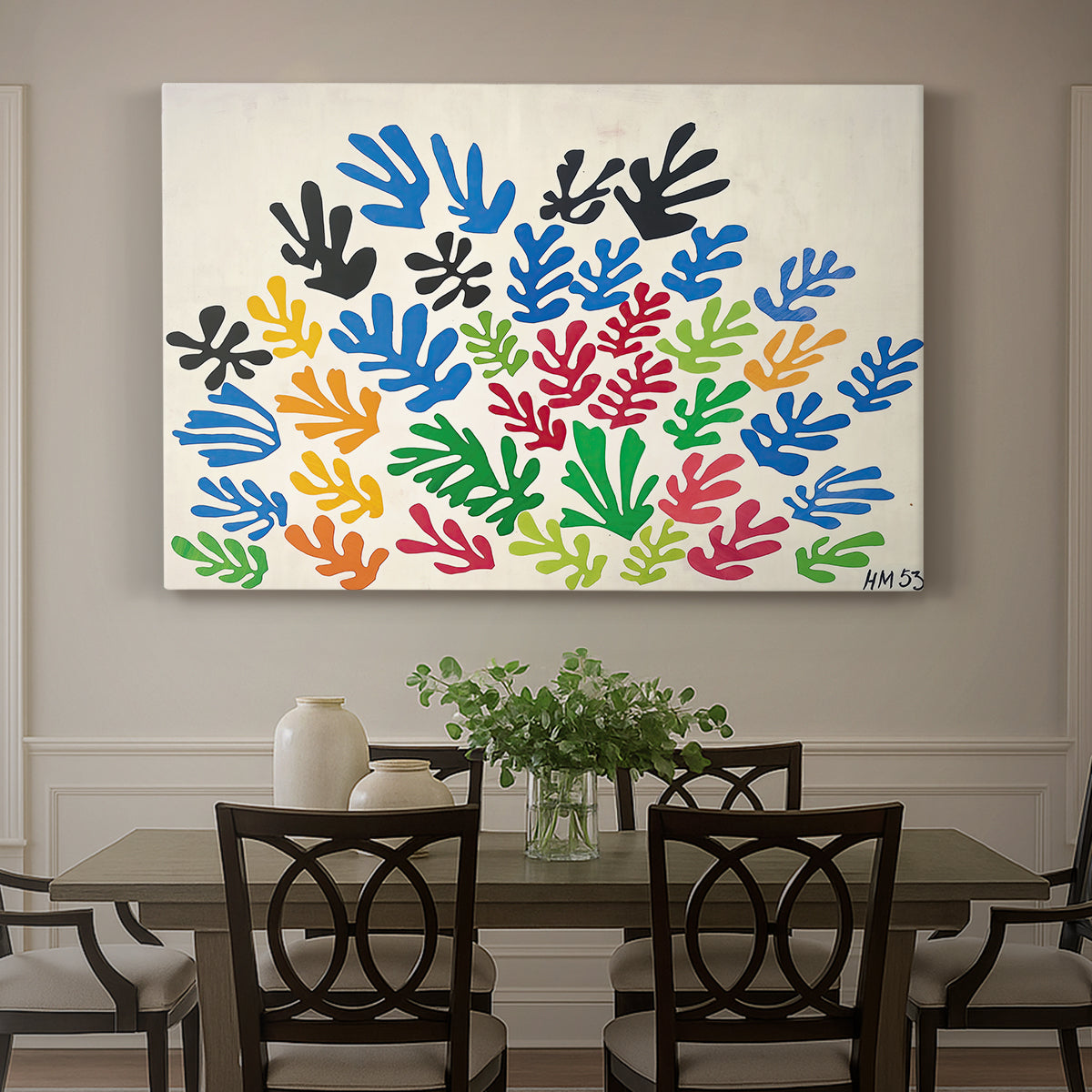 Canvas art print featuring an abstract arrangement of colorful leaf-like cut-outs, showcased as a statement wall artwork