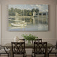 Canvas art print featuring a bridge spanning river with sailboats and reflections in water, showcased as a statement wall artwork