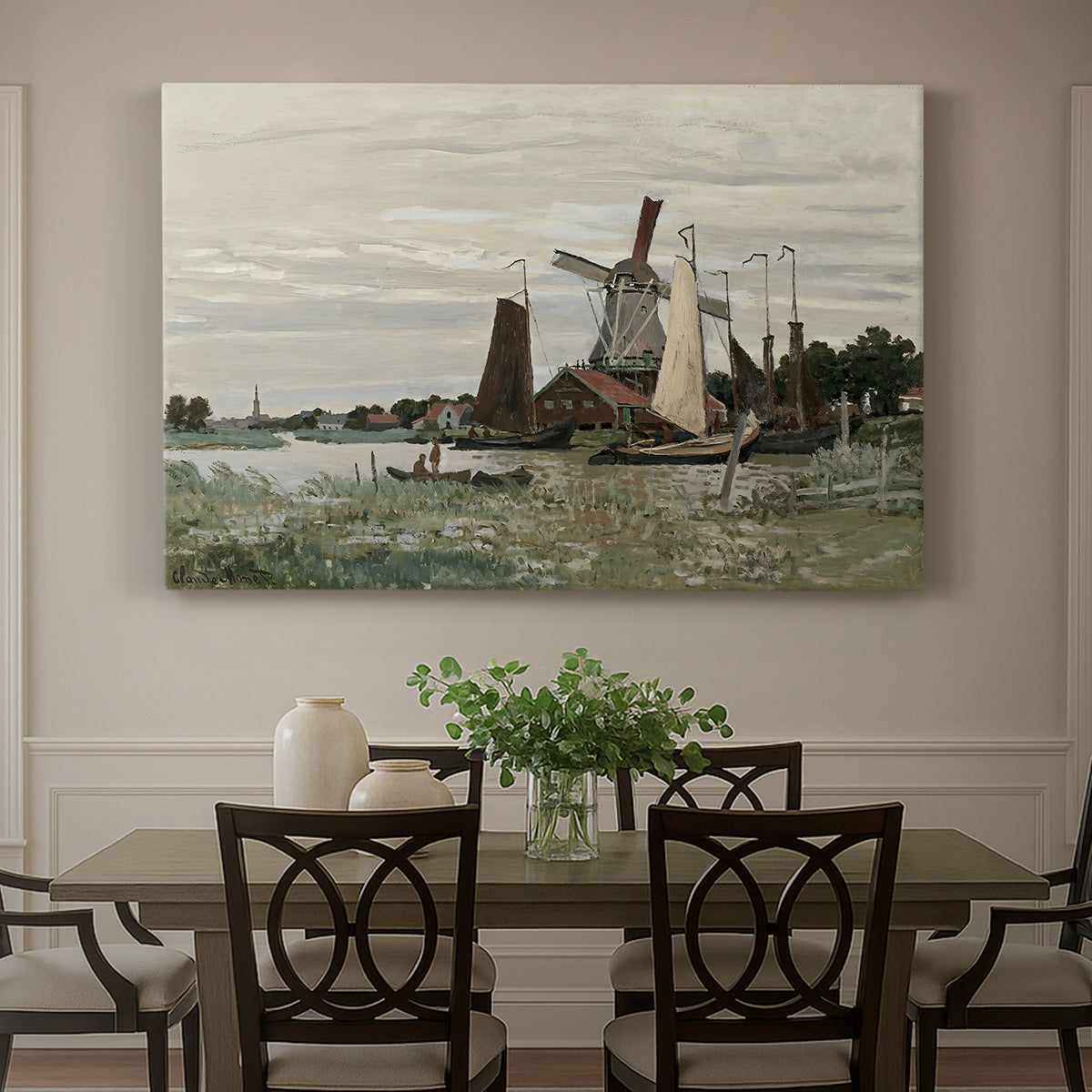Canvas art print featuring a single windmill beside water with surrounding buildings and sky, showcased as a statement wall artwork