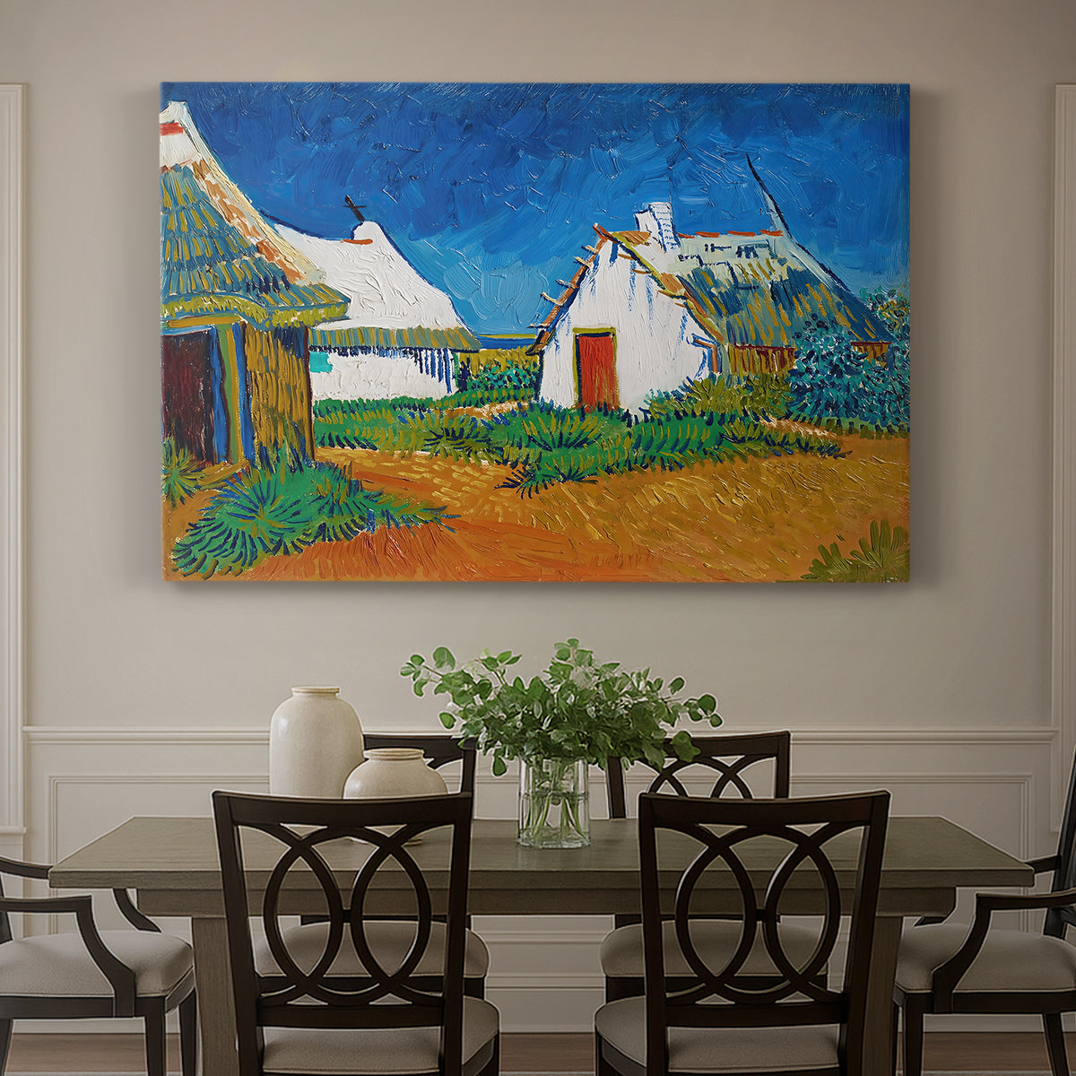 Canvas art print featuring white cottages grouped together with bold colors and surrounding landscape, showcased as a statement wall artwork