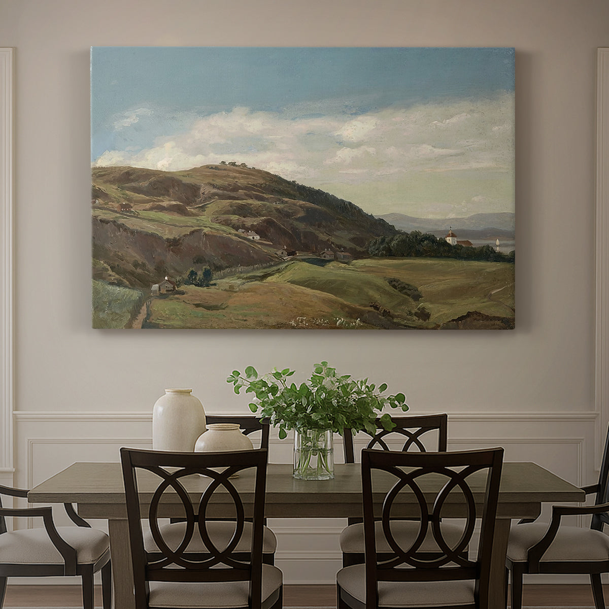 Canvas art print featuring a panoramic view of Oslo landscape with church and rolling hills under open sky, showcased as a statement wall artwork