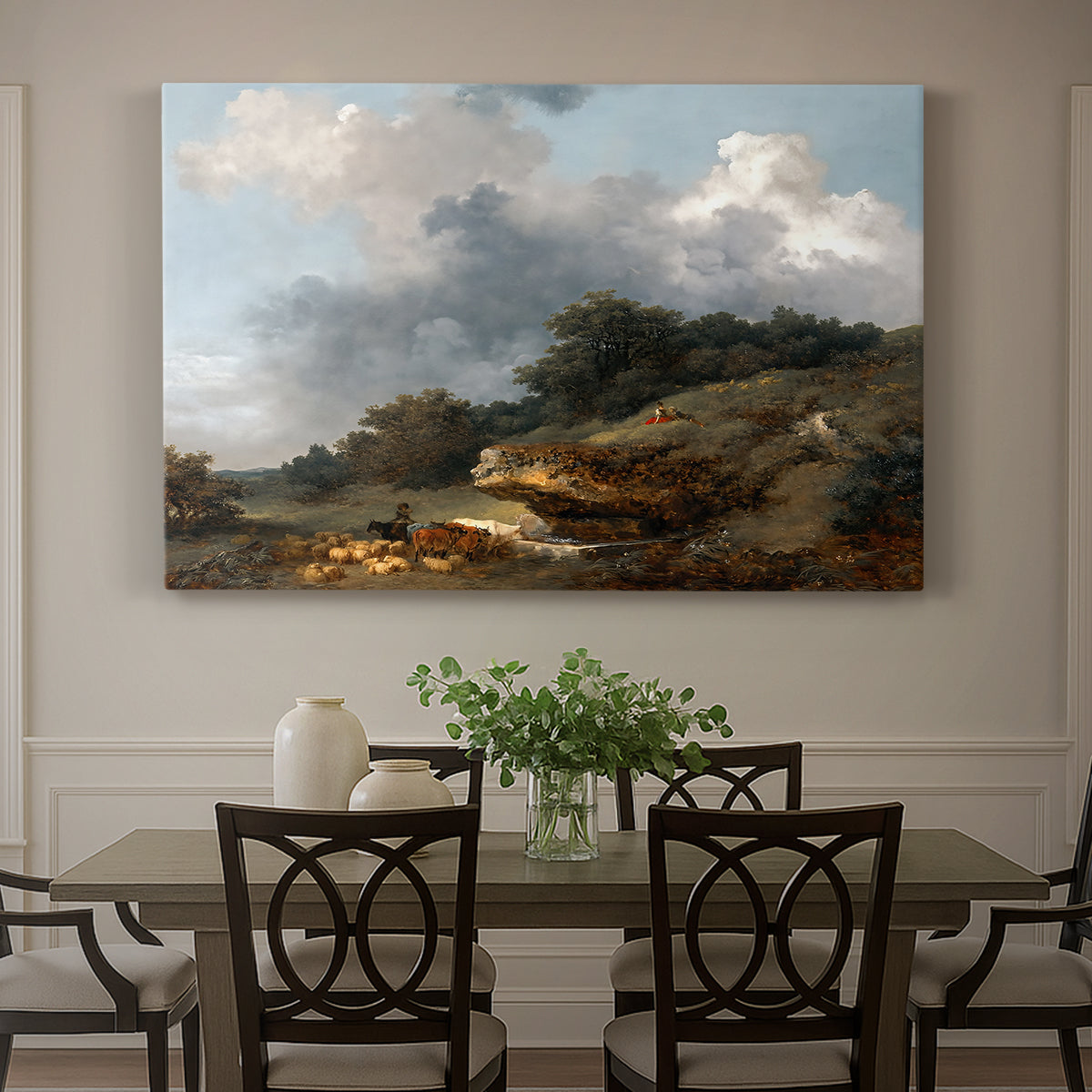 Canvas art print featuring a pastoral landscape with figures and animals gathered near water, showcased as a statement wall artwork
