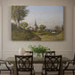 Canvas art print featuring a rural village with church surrounded by trees and open land, showcased as a statement wall artwork
