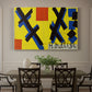Canvas art print featuring an abstract graphic design with bold shapes and color blocks arranged symmetrically, showcased as a statement wall artwork