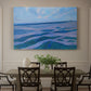Canvas art print featuring coastal dunes and water in horizontal color bands, showcased as a statement wall artwork