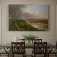 Canvas art print featuring a panoramic river landscape with contrast between stormy sky and calm farmland, showcased as a statement wall artwork
