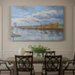 Canvas art print featuring a riverside landscape with water trees and distant structures, showcased as a statement wall artwork