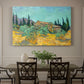 Canvas art print featuring rustic sheds surrounded by olive trees and tall cypresses in rural landscape, showcased as a statement wall artwork