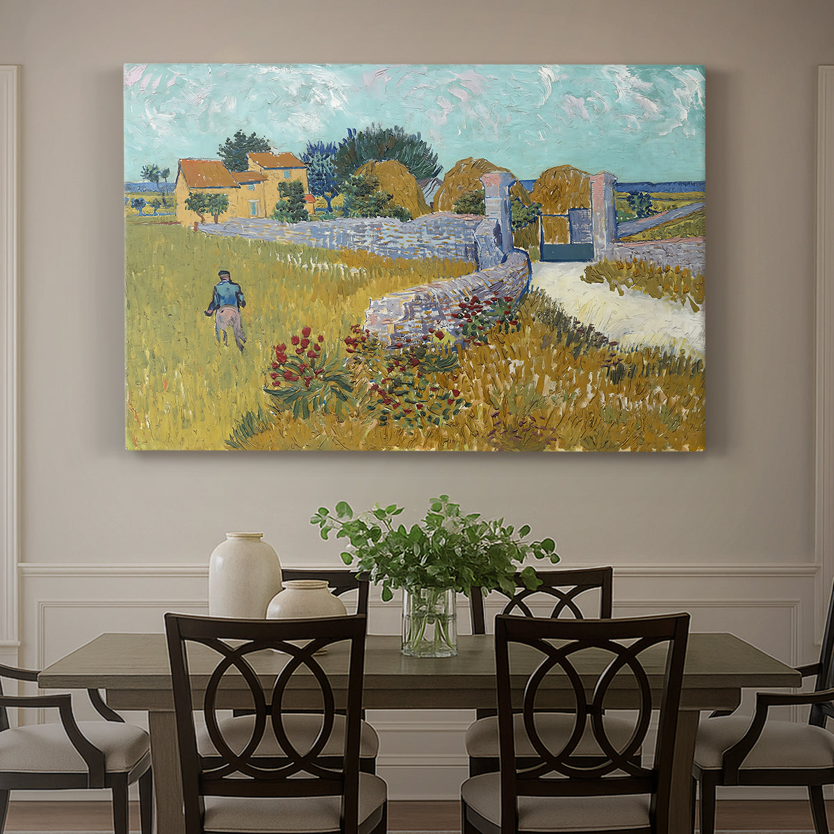 Canvas art print featuring a small farmhouse surrounded by yellow field and trees under blue sky, showcased as a statement wall artwork