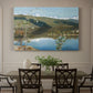 Canvas art print featuring a dramatic landscape with dark thunderclouds forming over distant water and hills, showcased as a statement wall artwork