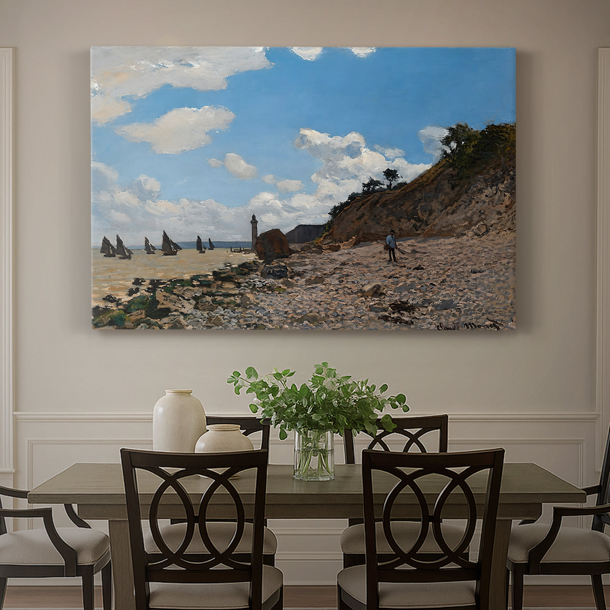 Canvas art print featuring a coastal beach scene with figures gathered along shoreline and boats nearby, showcased as a statement wall artwork