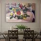 Canvas art print featuring a tabletop still life with pineapple, lemons, and fruit, showcased as a statement wall artwork