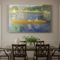 Canvas art print featuring two figures seated in a small boat drifting across calm water, showcased as a statement wall artwork