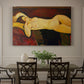 Canvas art print featuring a reclining nude woman with head turned and elongated body on draped surface, showcased as a statement wall artwork