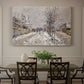 Canvas art print featuring a snow-covered street lined with trees and buildings under winter sky, showcased as a statement wall artwork