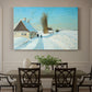 Canvas art print featuring a person shoveling snow outside house in bright winter landscape, showcased as a statement wall artwork