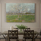 Canvas art print featuring evenly spaced trees covered in blossoms across flat orchard landscape, showcased as a statement wall artwork