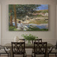 Canvas art print featuring a woman and child seated along riverbank beneath trees in soft daylight, showcased as a statement wall artwork