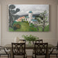 Canvas art print featuring a blue villa surrounded by trees and greenery in a bright landscape, showcased as a statement wall artwork