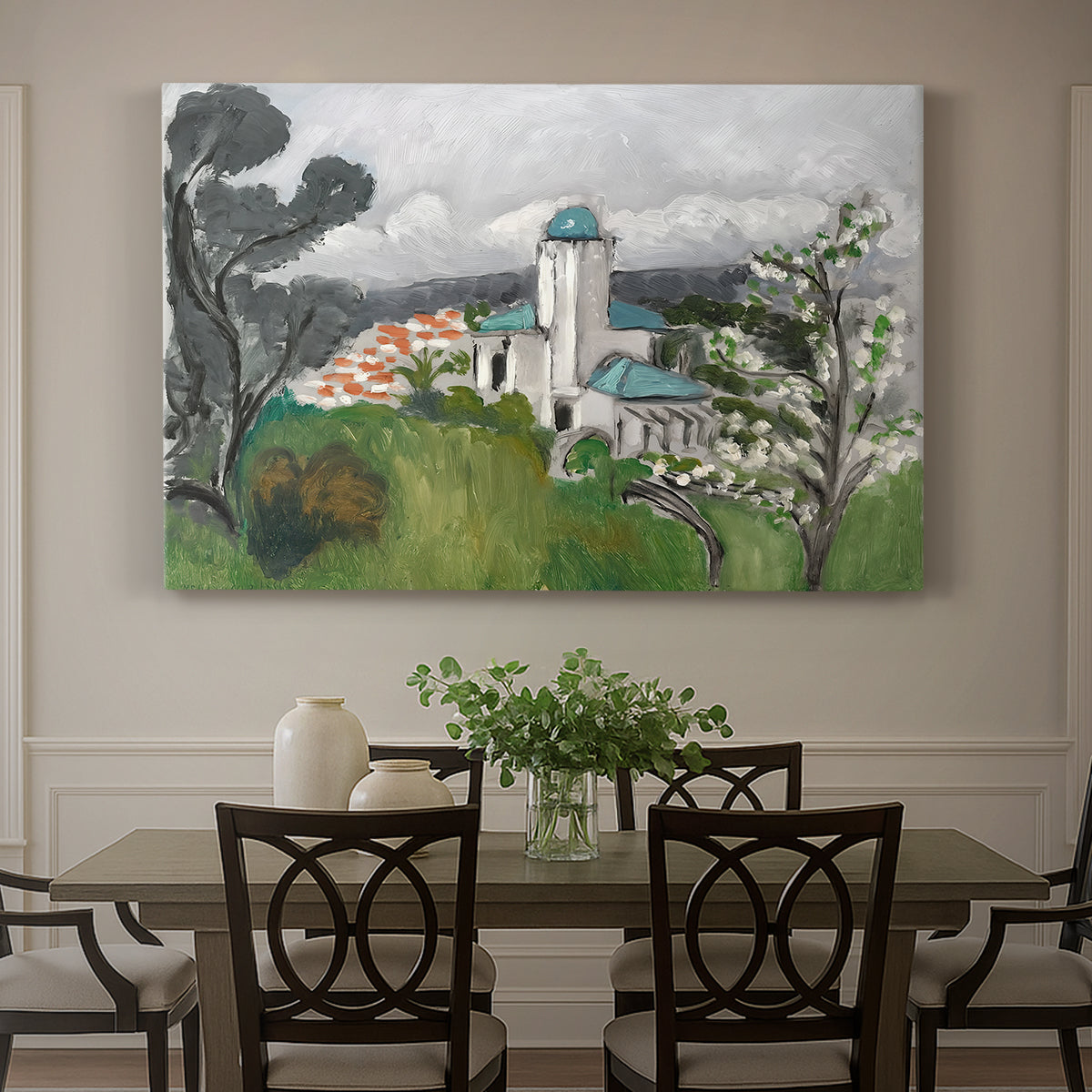 Canvas art print featuring a blue villa surrounded by trees and greenery in a bright landscape, showcased as a statement wall artwork