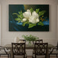 Canvas art print featuring a large magnolia flowers arranged on blue velvet, showcased as a statement wall artwork