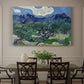 Canvas art print featuring an olive grove with twisted trees set before distant mountain range, showcased as a statement wall artwork