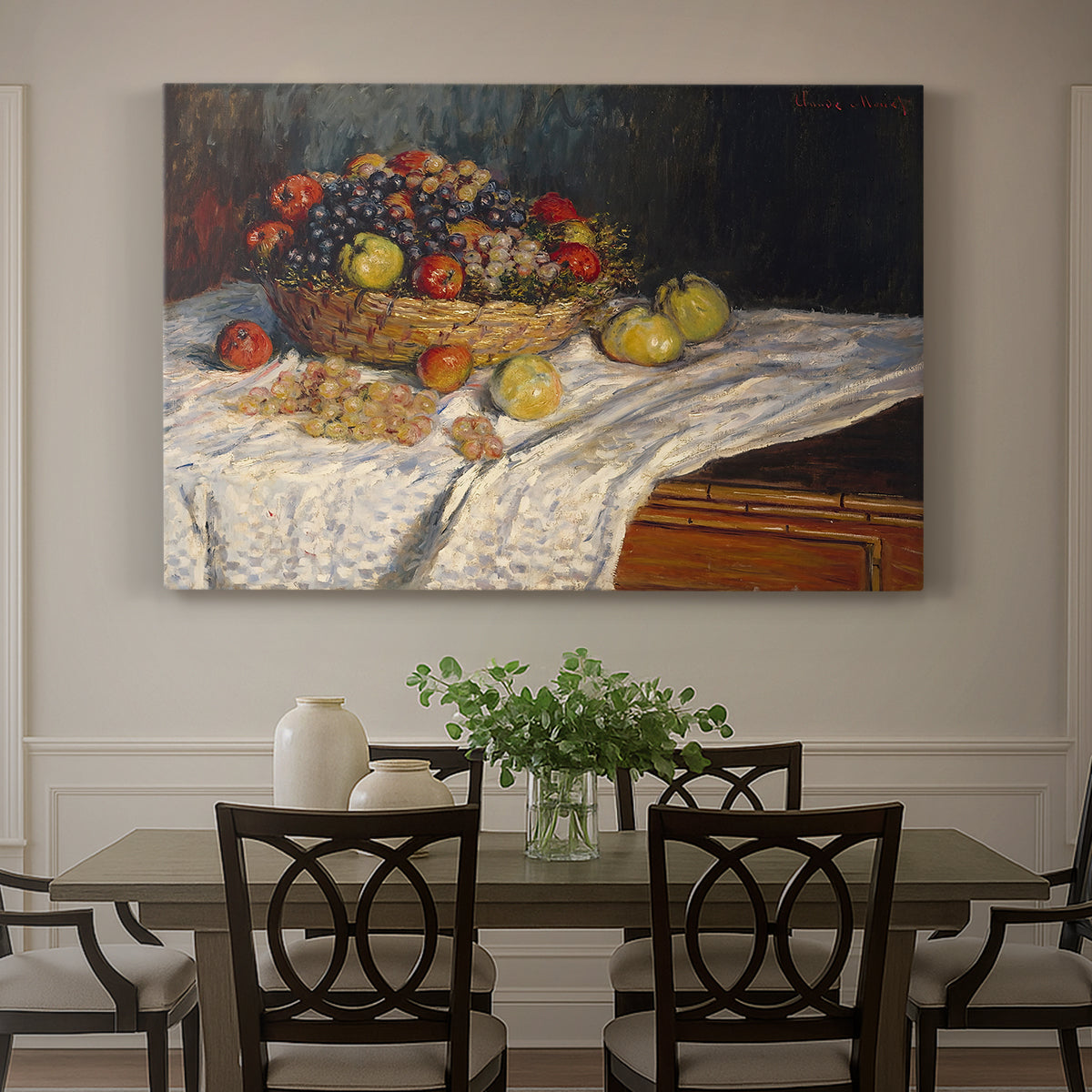 Canvas art print featuring an arrangement of apples and grapes on table with soft natural light, showcased as a statement wall artwork