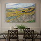 Canvas art print featuring a ploughed field enclosed by low walls with lone worker under broad sky, showcased as a statement wall artwork