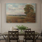 Canvas art print featuring a wide landscape with distant buildings across terrain, showcased as a statement wall artwork
