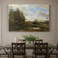 Canvas art print featuring figures washing clothes beside riverbank surrounded by trees, showcased as a statement wall artwork