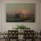 Canvas art print featuring a haystack in field under warm sunset sky, showcased as a statement wall artwork
