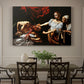 Canvas art print featuring Judith cutting off Holofernes' head as maidservant assists beside her, showcased as a statement wall artwork