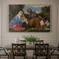 Canvas art print featuring a holy family gathered with shepherd in rustic outdoor setting, showcased as a statement wall artwork