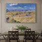 Canvas art print featuring a figure harvesting wheat in expansive field under bright sky, showcased as a statement wall artwork