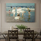 Canvas art print featuring people relaxing and wading in shallow ocean water along a sunny beach, showcased as a statement wall artwork