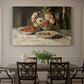 Canvas art print featuring a still life with strawberries, glassware, and bottle arranged on table, showcased as a statement wall artwork