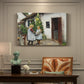 Canvas art print featuring a woman and child standing outside farmhouse searching for missing kitten, presented within a refined interior setting